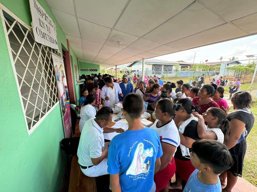 people waiting to receive the medical help