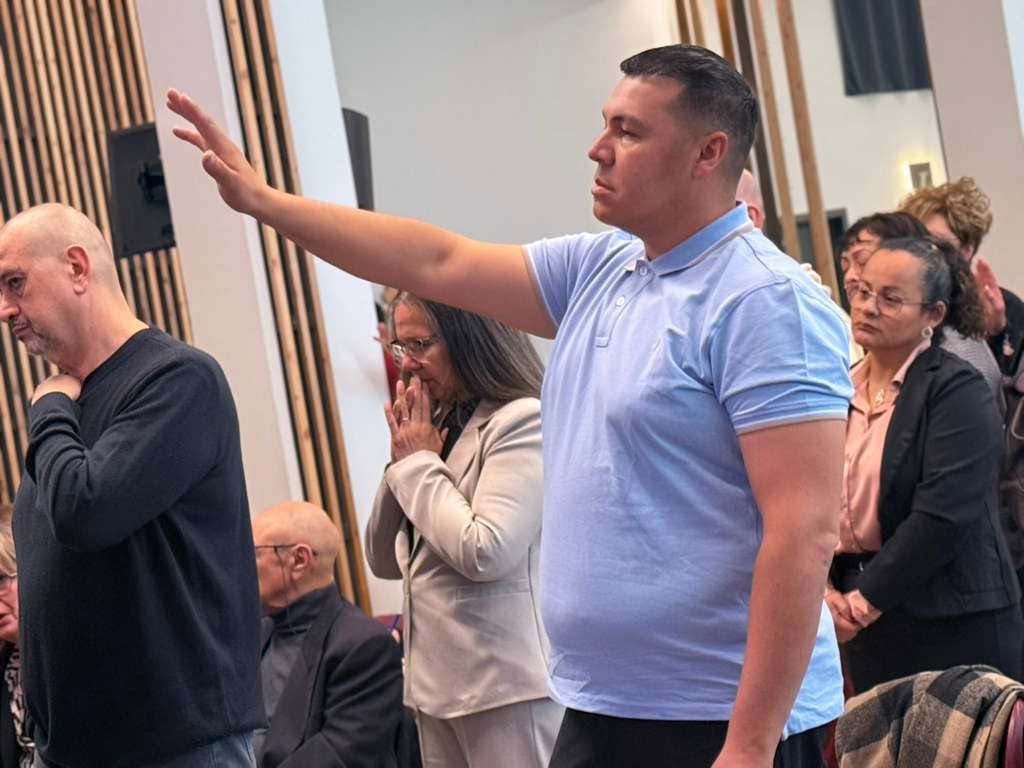 people praying at the church